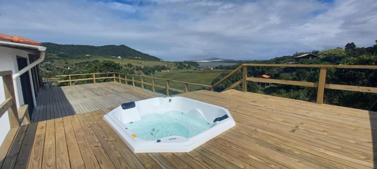 Villa Santorini Praia Do Rosa Com Piscina E Jacuzzi Exterior photo